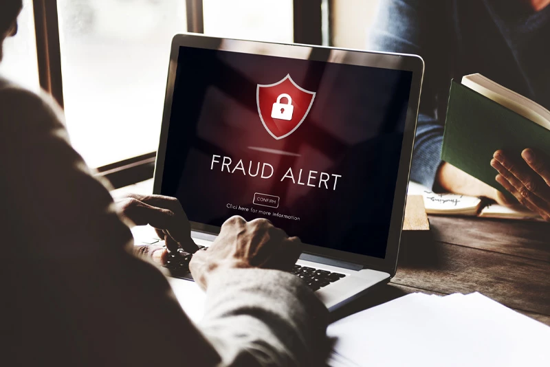 Image of a computer screen displaying a fraud alert message