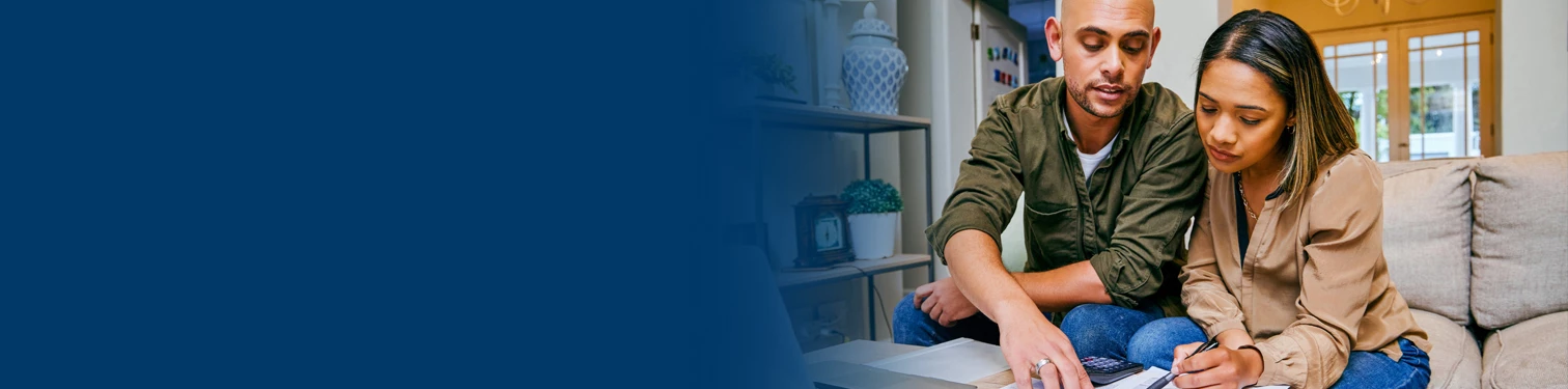 A couple looking at savings options