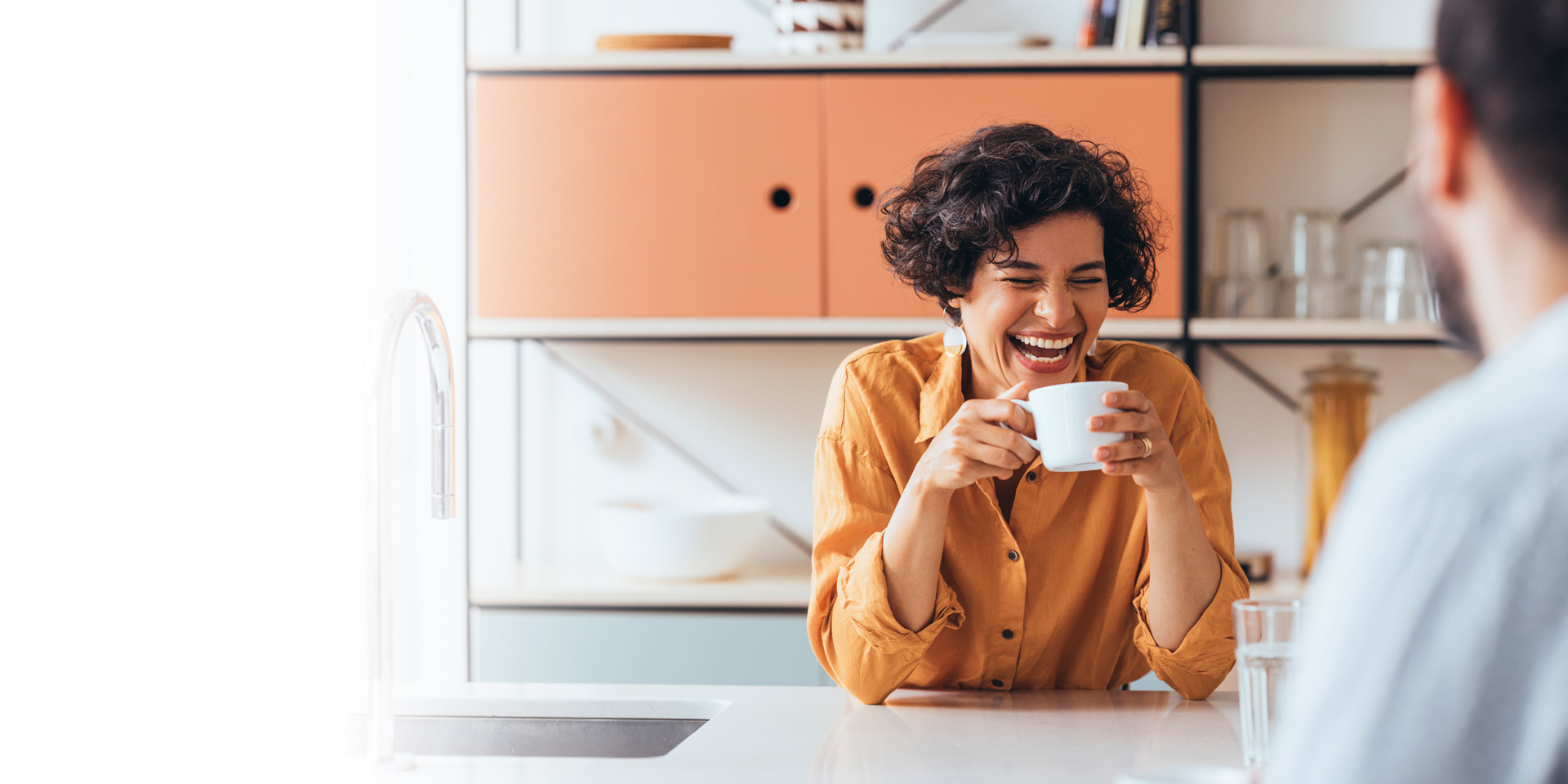 A woman having coffee with friends