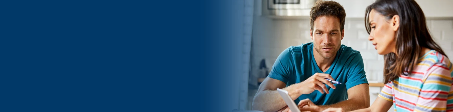 A couple looking at personal loan options