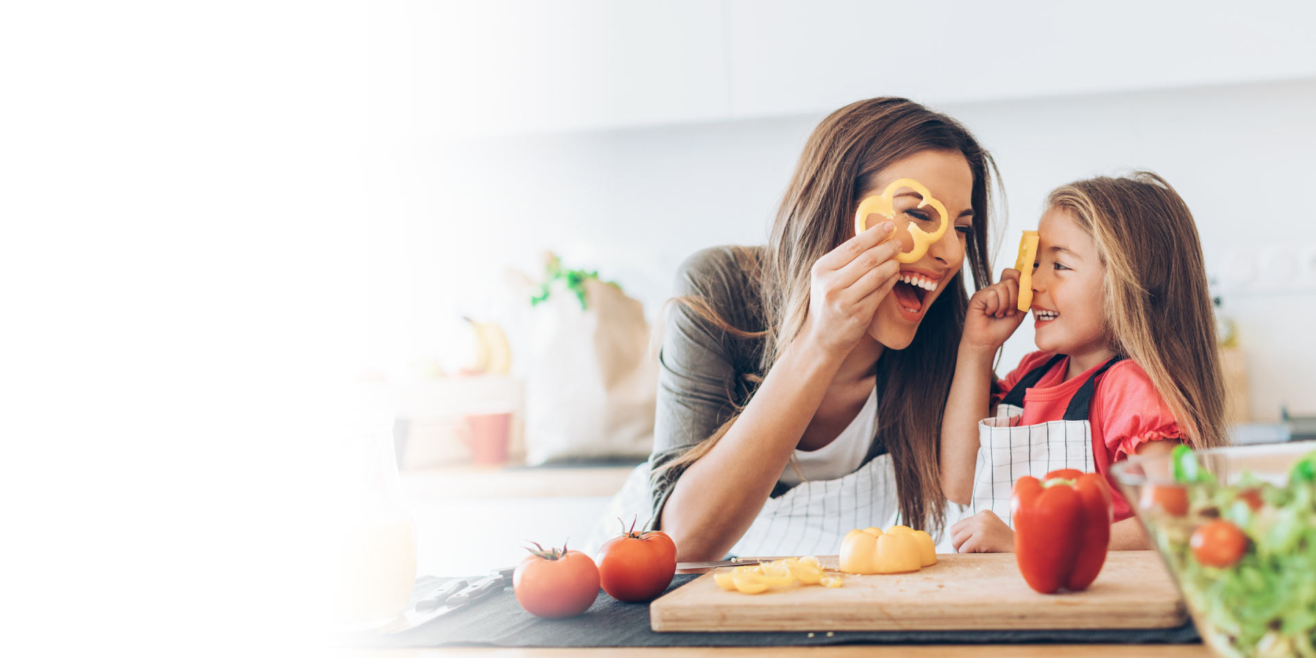 A mother and daughter eating lunch