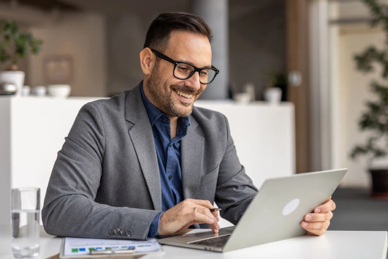 A man working at his laptop