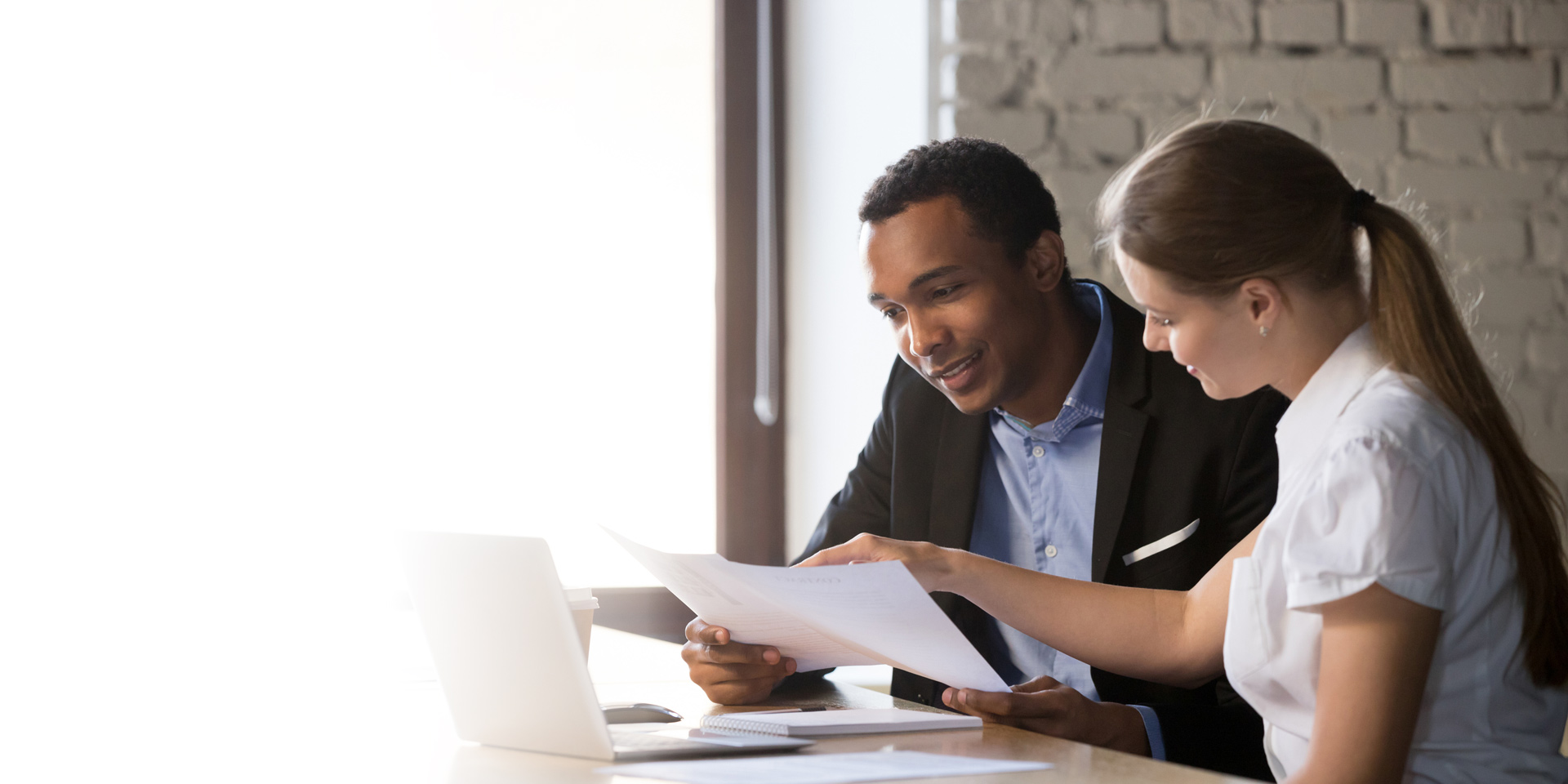 A lender walking through mortgage options with a client