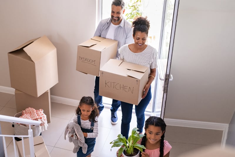 A family moving into their new home