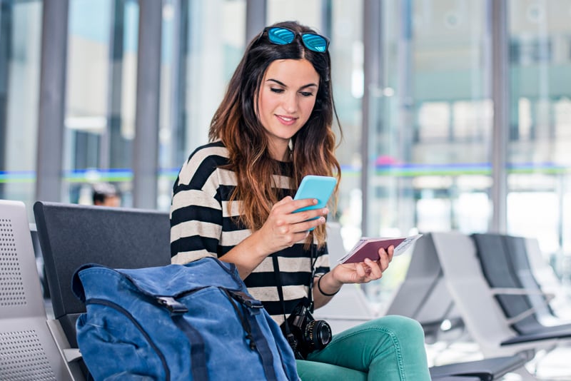 A woman checking her mobile app