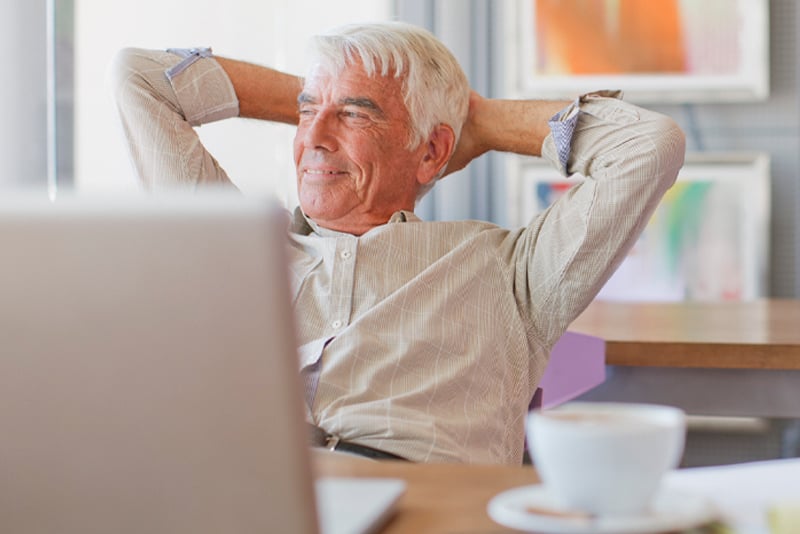 A man relaxing in his chair