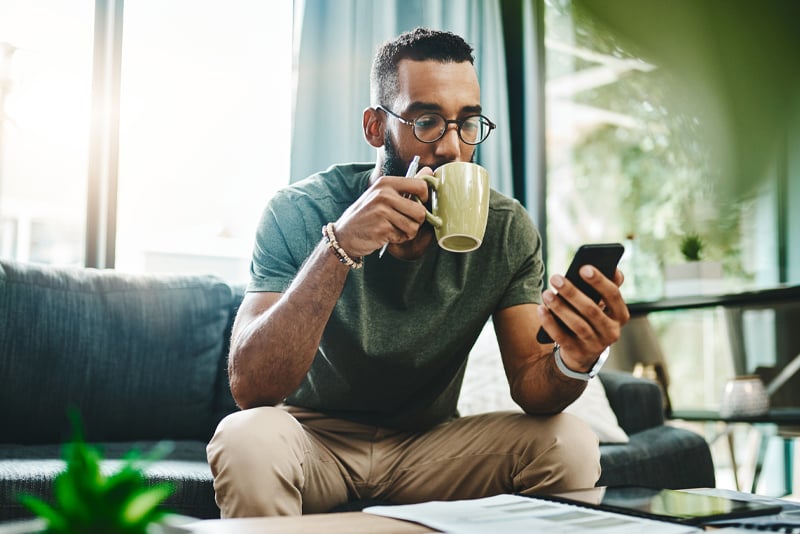 A man checking his mobile device