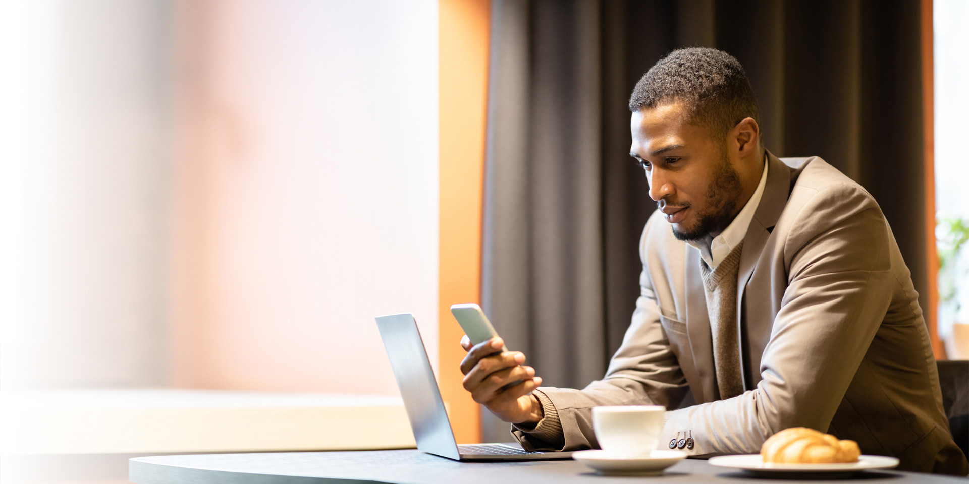 A business man on his mobile device