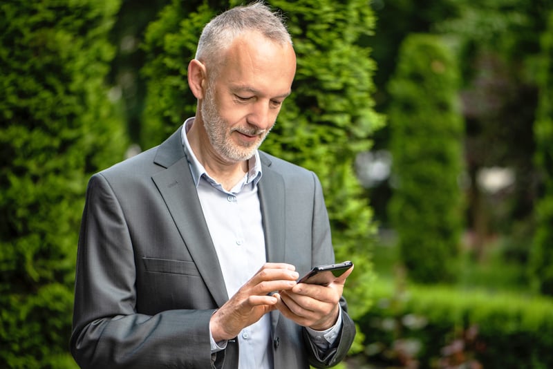 A man on his mobile device