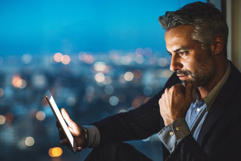 A man working on his mobile device