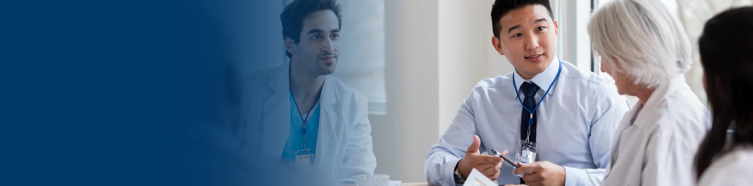 A meeting in a room filled with medical staff