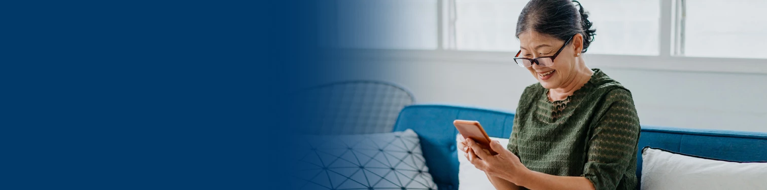 A woman on her mobile device looking at her account