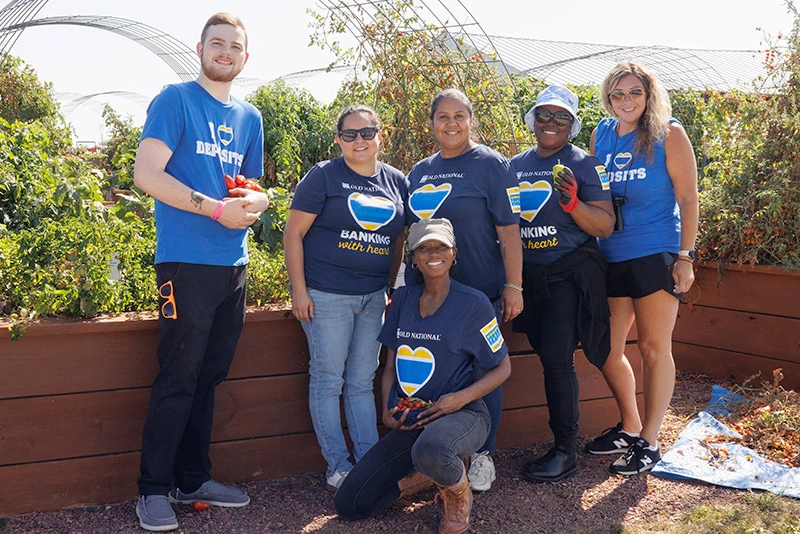 Coworkers out in the community volunteering