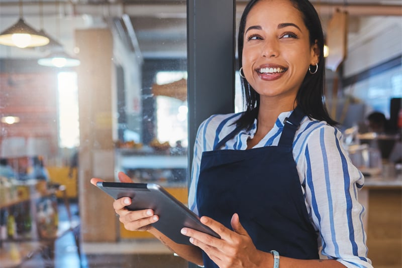 A small business worker helping a client