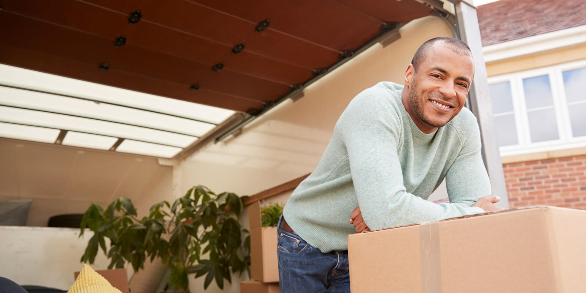 A man getting ready to move to his new home