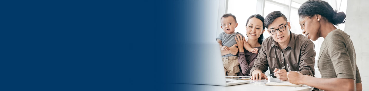 A banker helping a family look at their financial potential