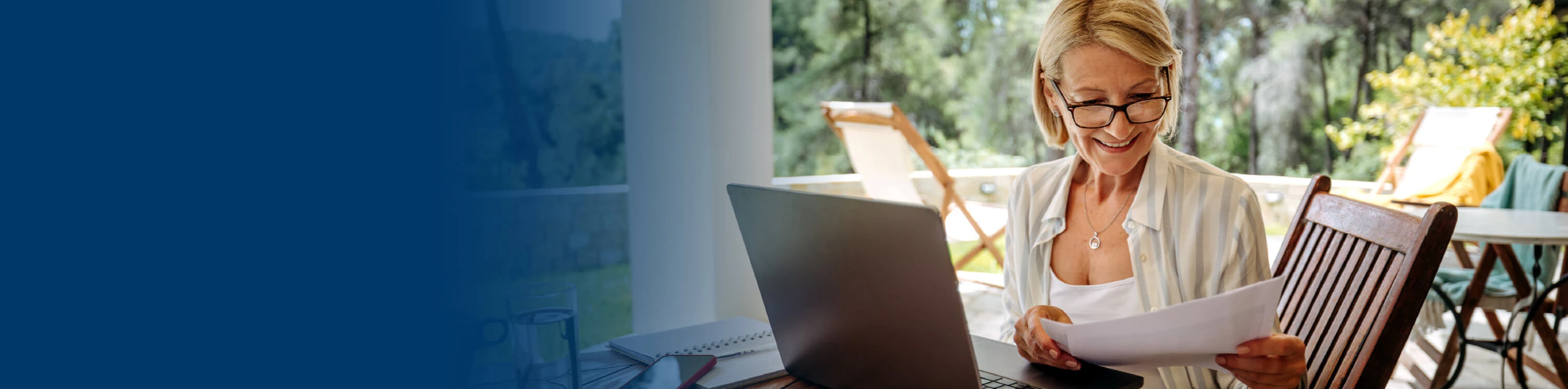 A woman looking at her financial statements