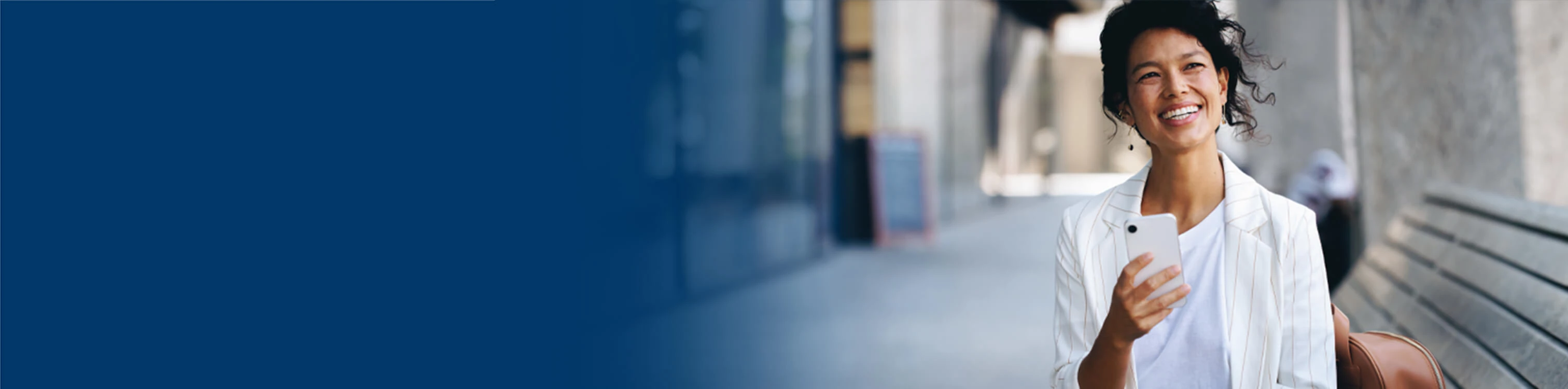 A woman walking and talking on her phone