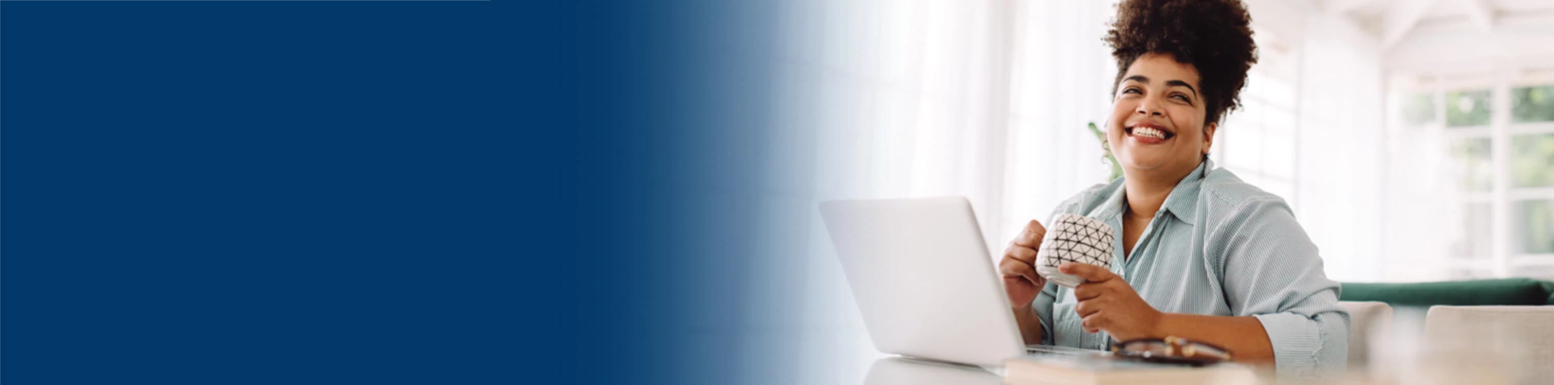 A woman working at her laptop
