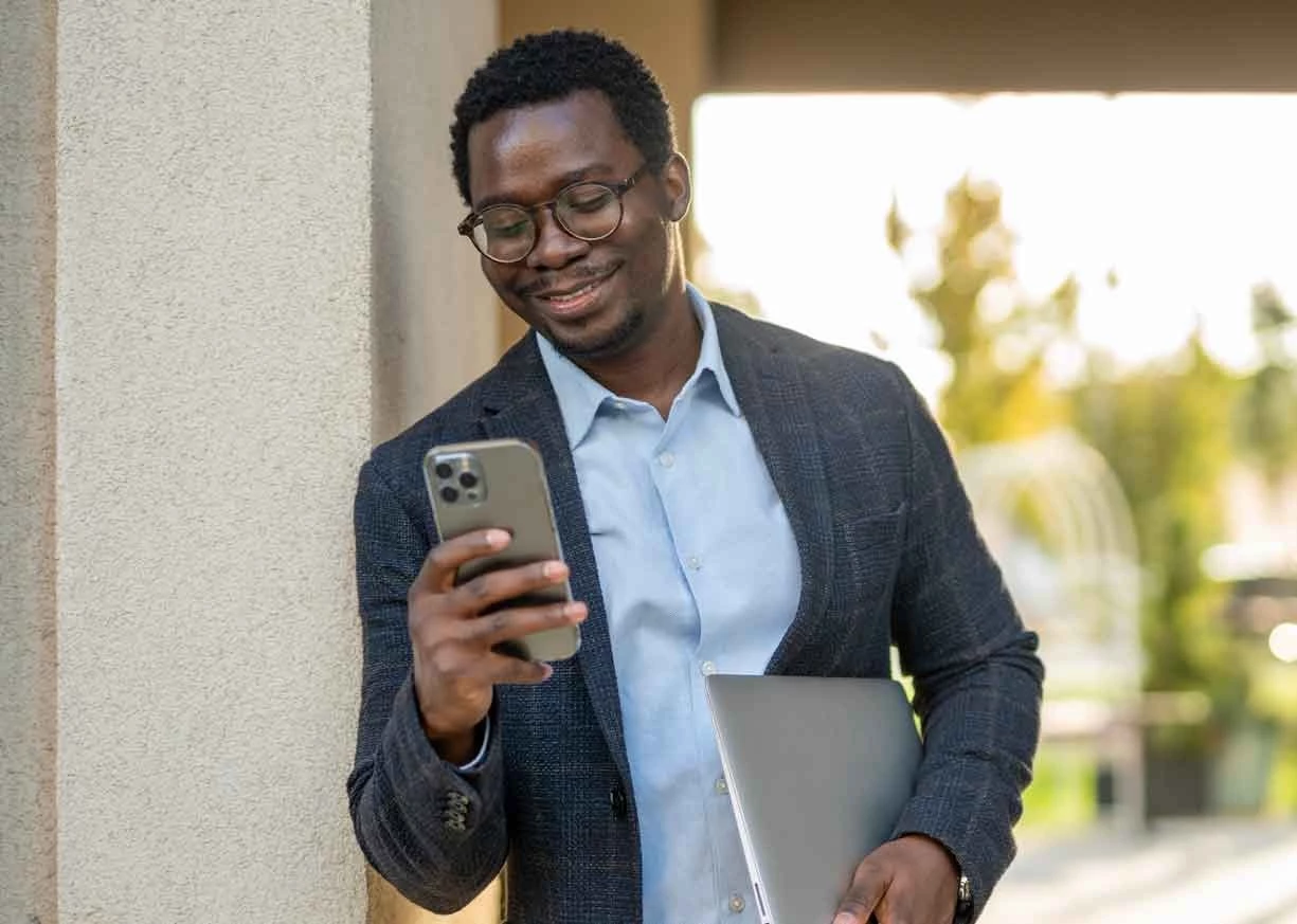 A man looking at instructions on how to activate Zelle