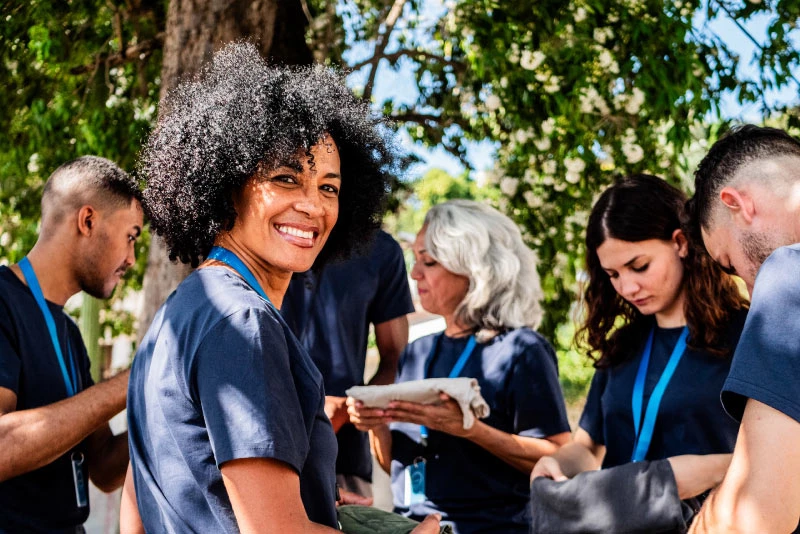 A group of associates volunteering in the community