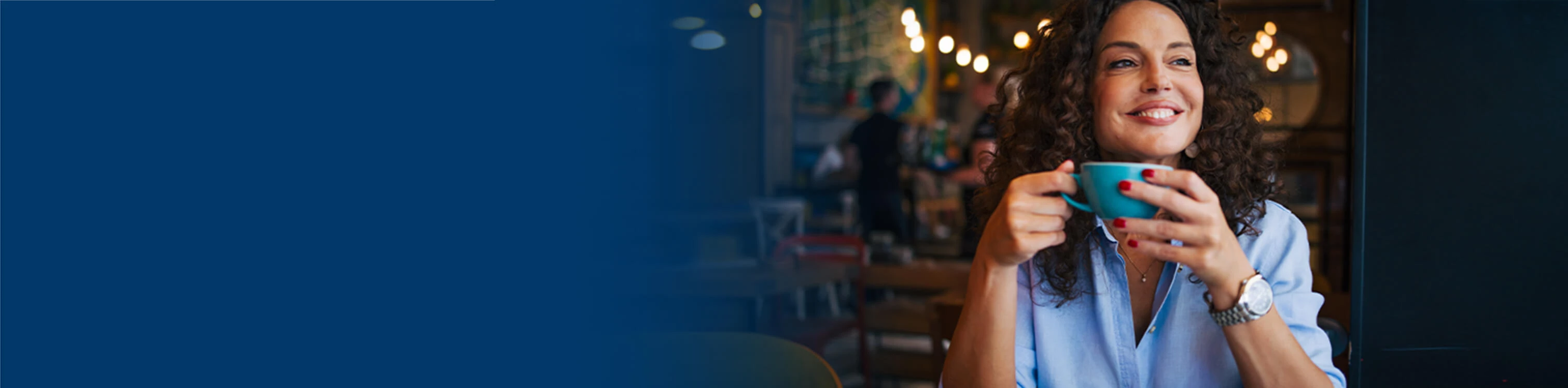 A woman drinking coffee at the coffee shop