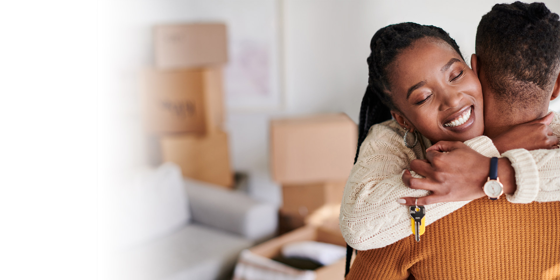 A woman excited about closing on their first home