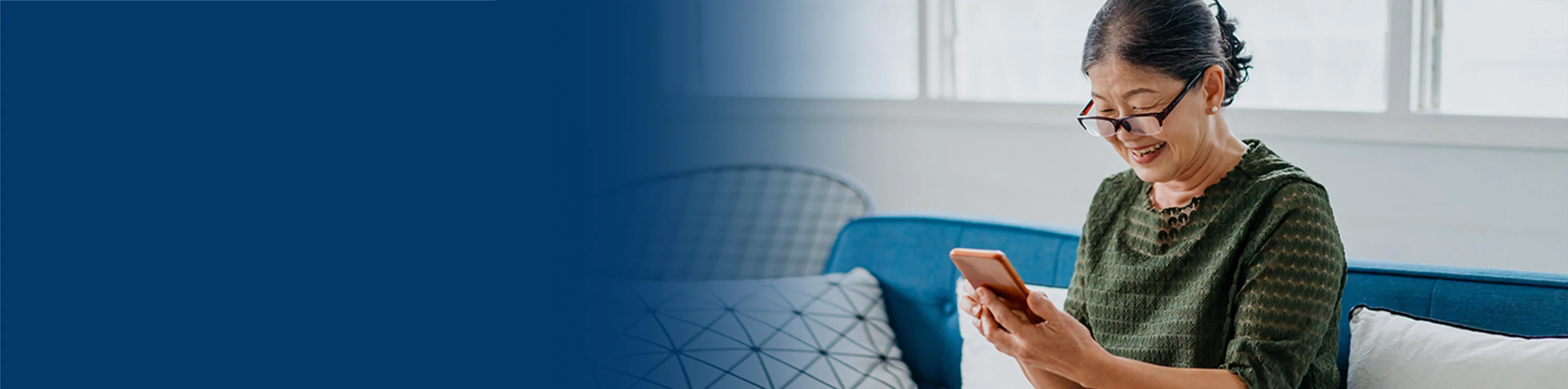 A woman on her mobile device looking at her account