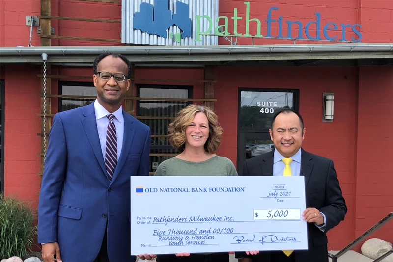 Presenting a check to the community