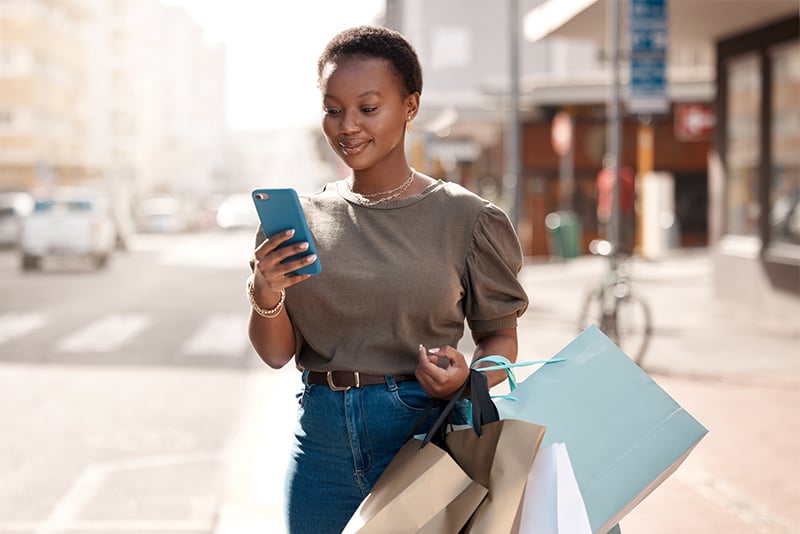 A client looking at her mobile device