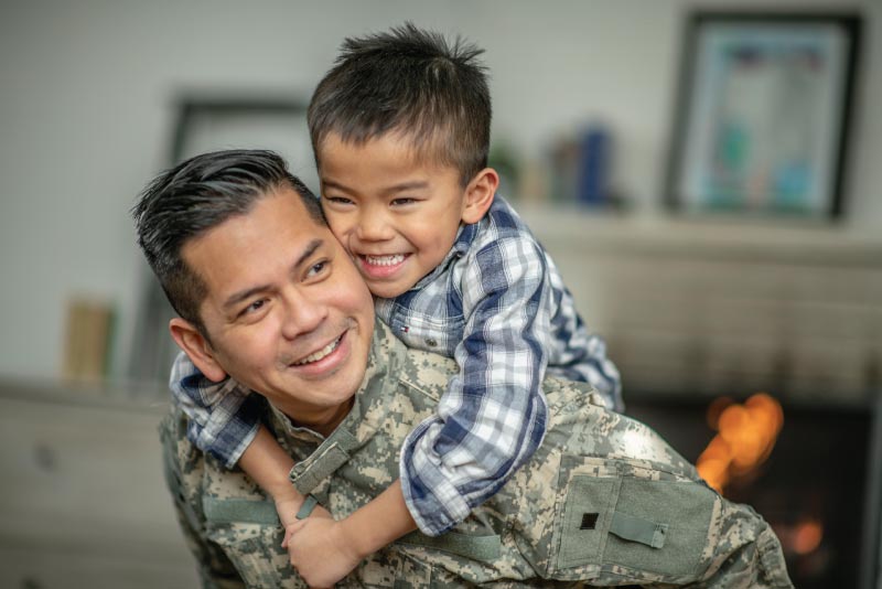 A son giving his dad a hug