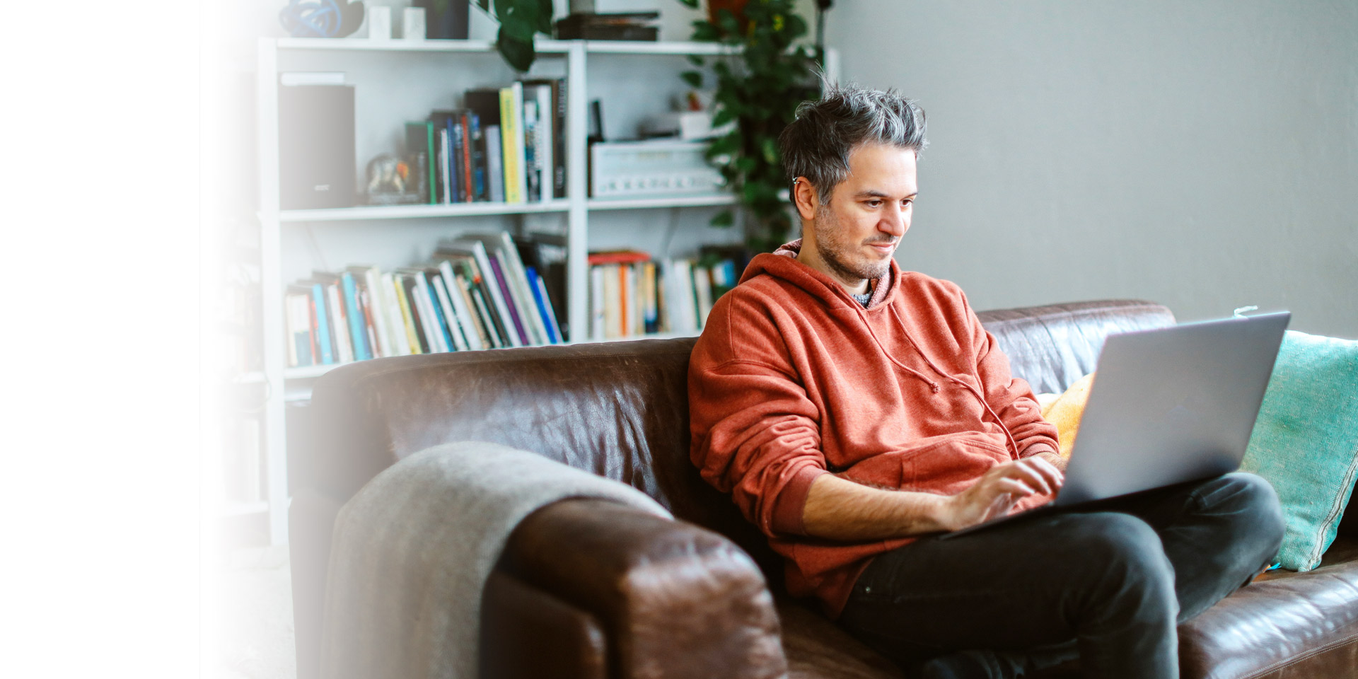 A man looking at his banking account online