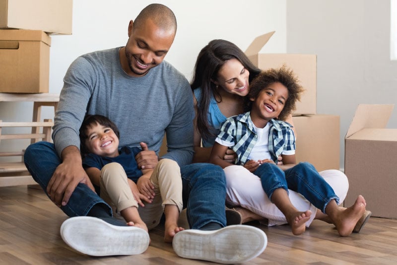 A family hanging out in there new home