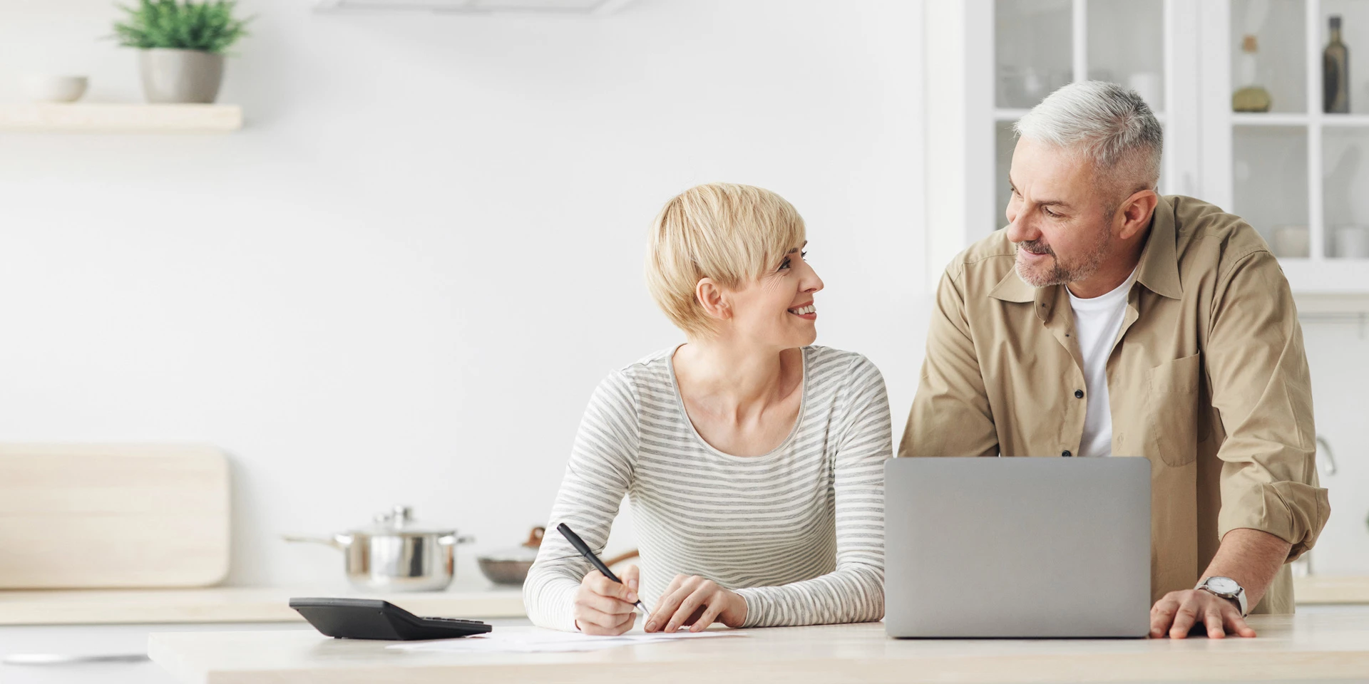 A couple logging into Online Banking