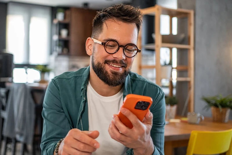 A client looking at personal banking on his mobile device