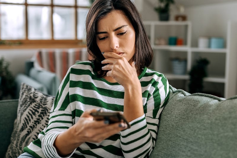 A woman looking at her emails