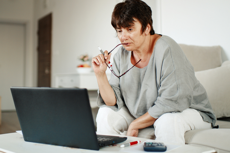 A woman reading her emails