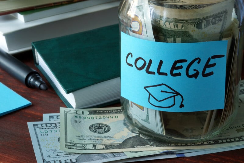 A jar collecting college money for unexpected expenses