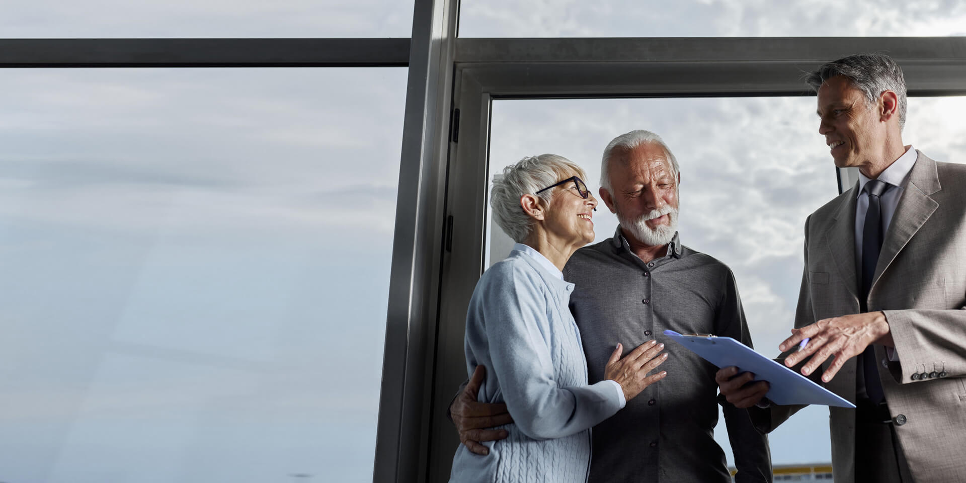 A couple meeting with their Banker to discuss financial options
