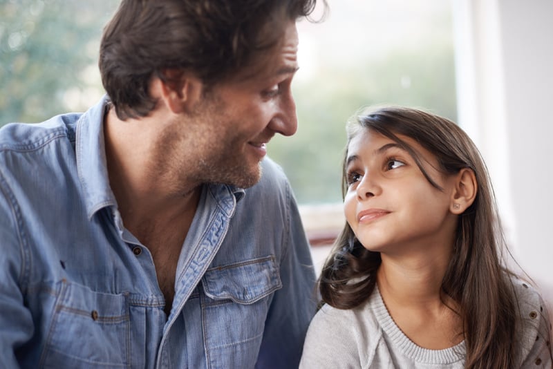 A father and daughter hanging out together