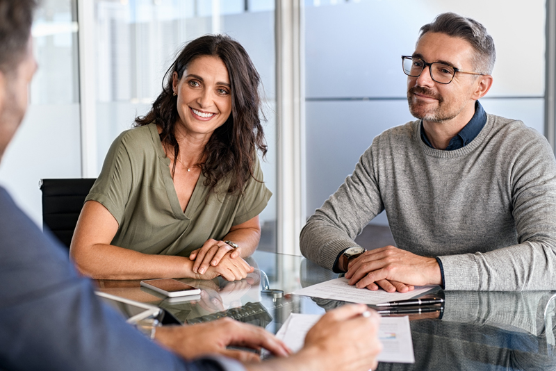 A couple meeting with their banker