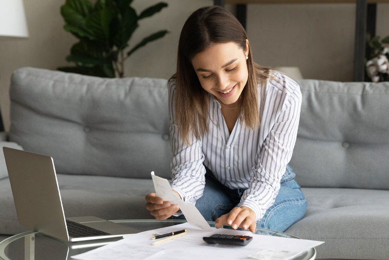 A woman working on a savings plan