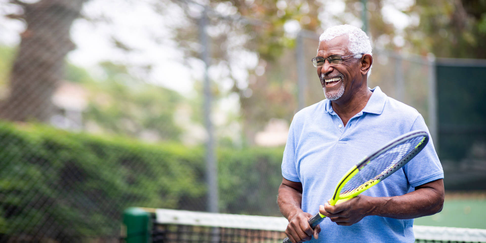 A man out playing tennis