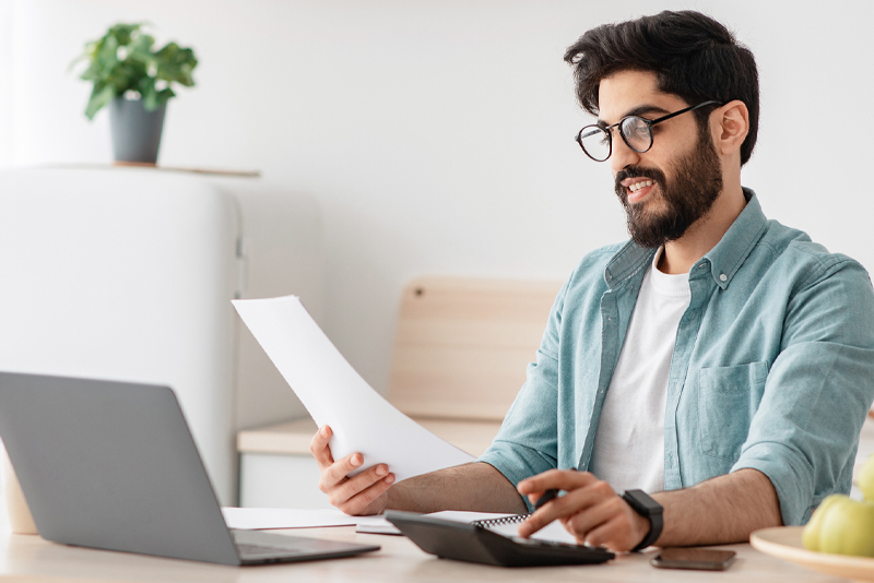 A man looking over his finances