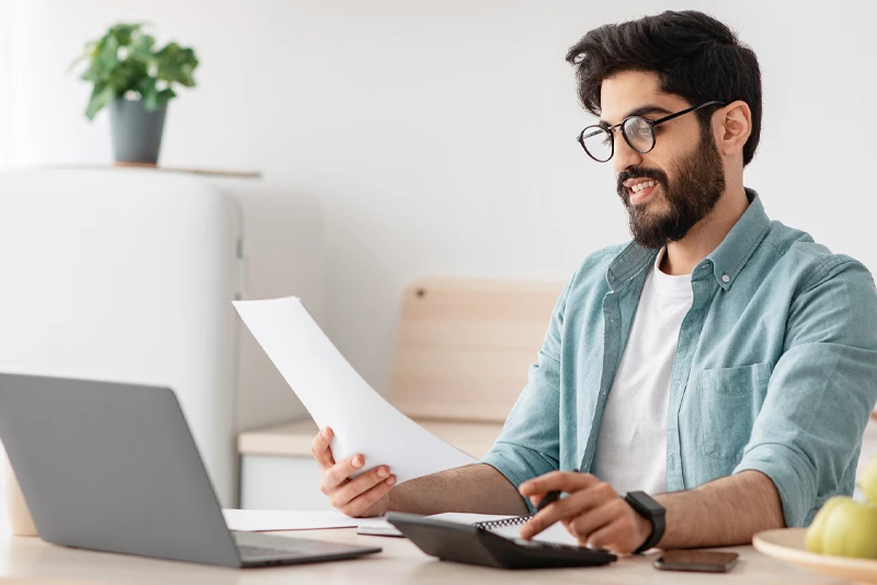 A man looking over his finances
