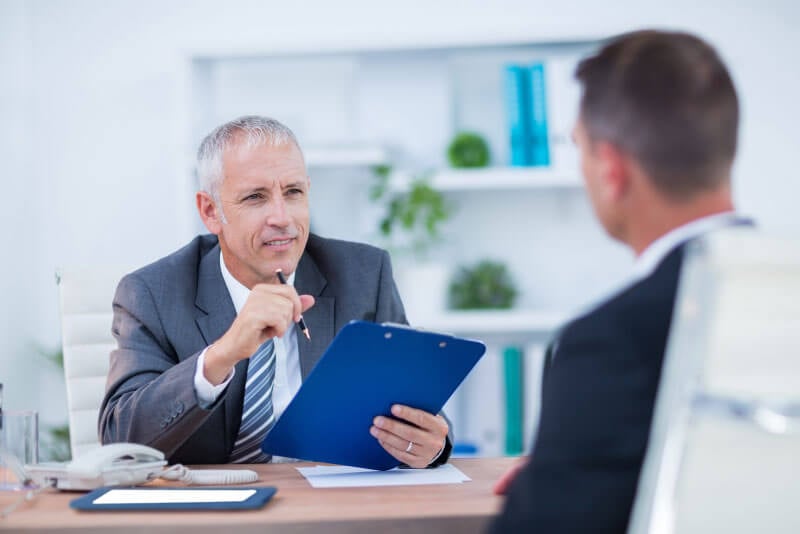 A client having a meeting with his banker