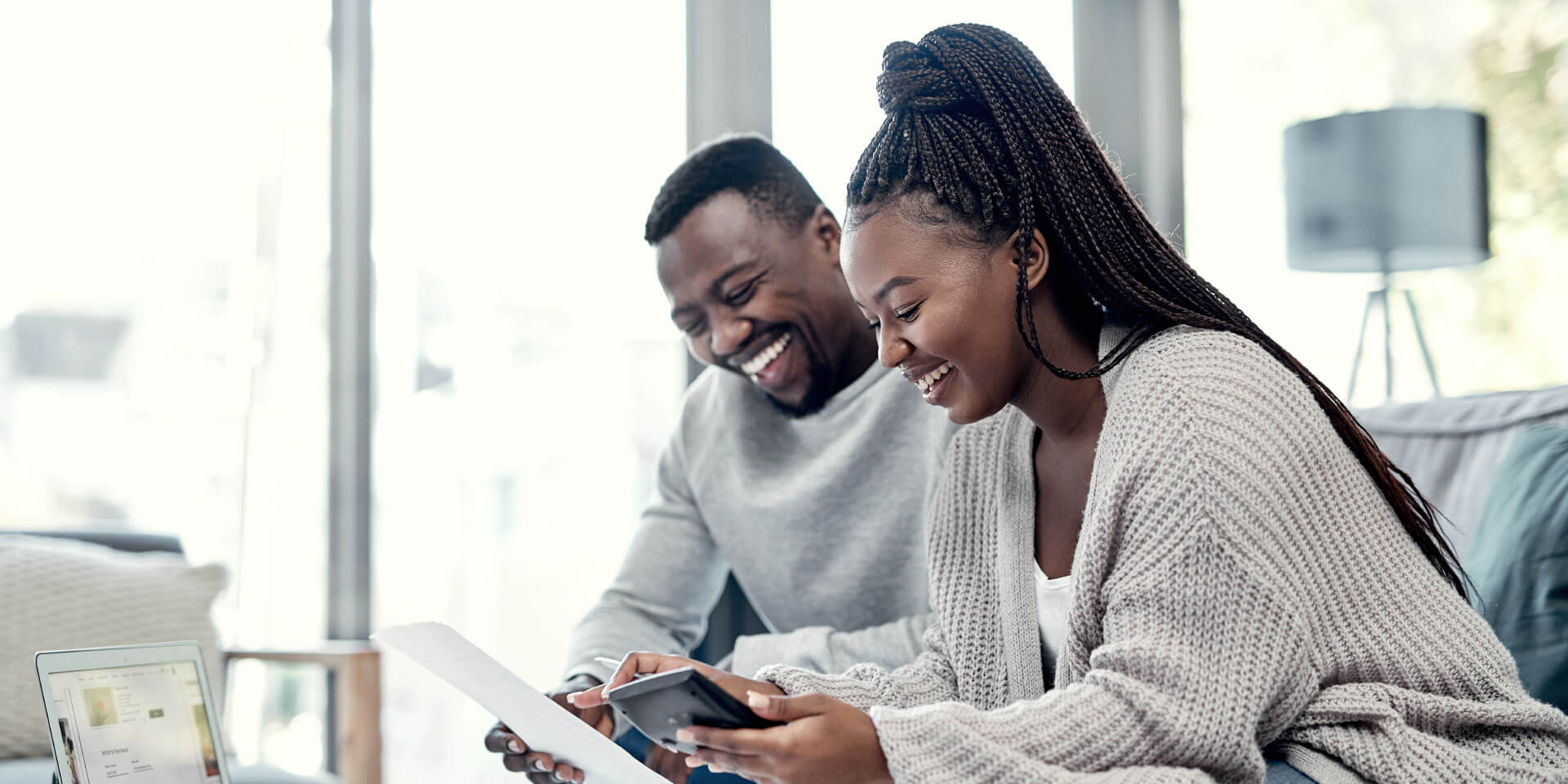 A couple researching a new loan