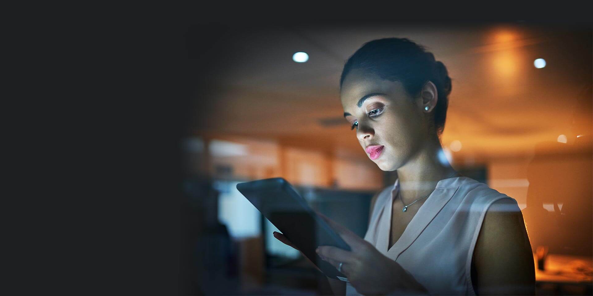 A young woman on a mobile device logging in to her Easy Checking account