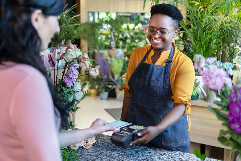 A shopper paying by card