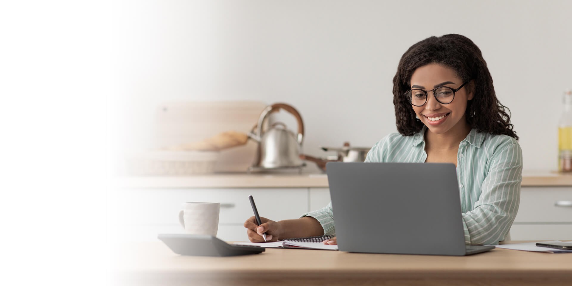 A woman working on her laptop